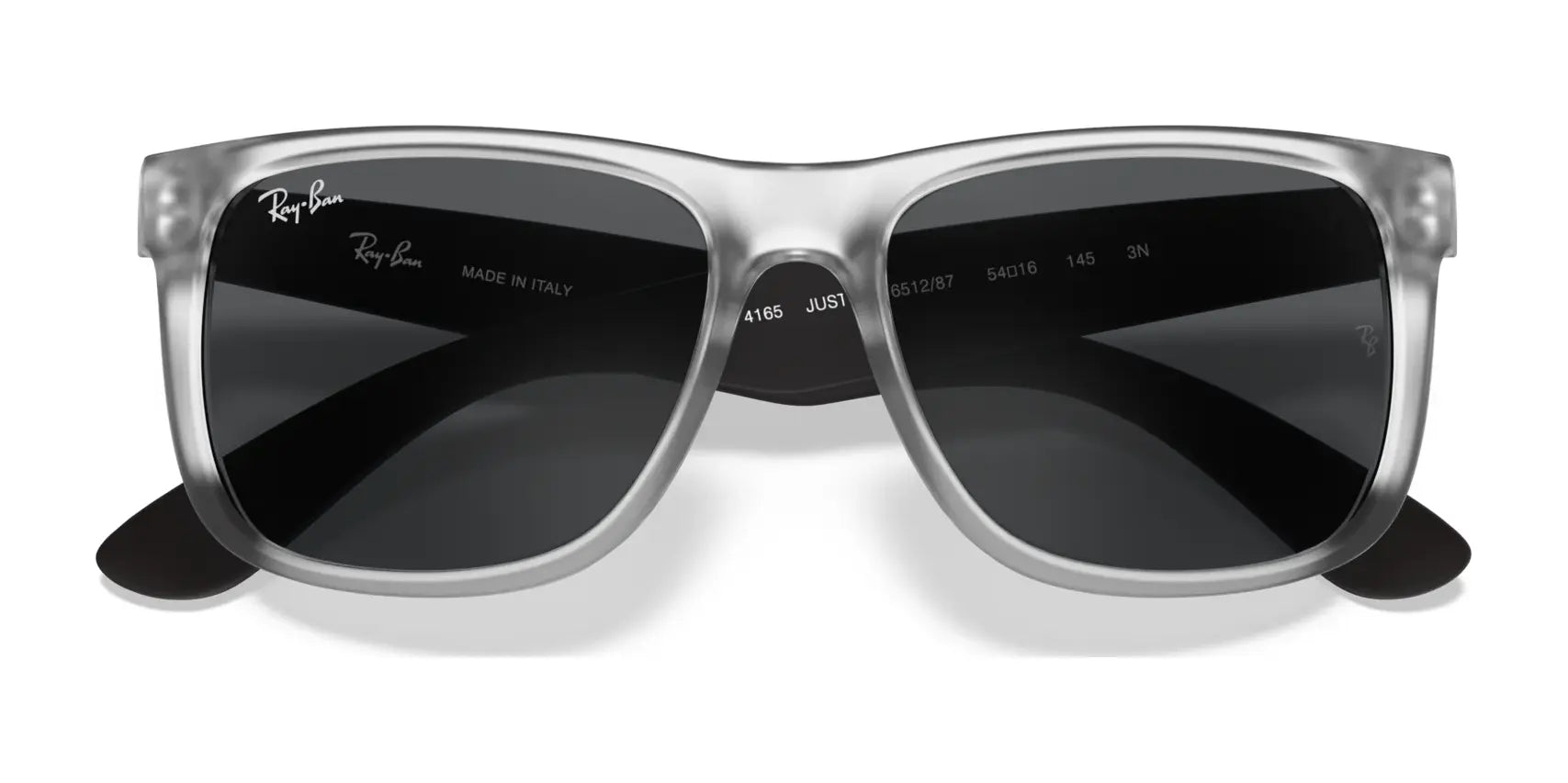 The Ray-Ban JUSTIN RB4165 Sunglasses feature a translucent gray frame and dark lenses with the brand logo on top left. Offering 100% UV protection, their square shape makes them stylish and functional.