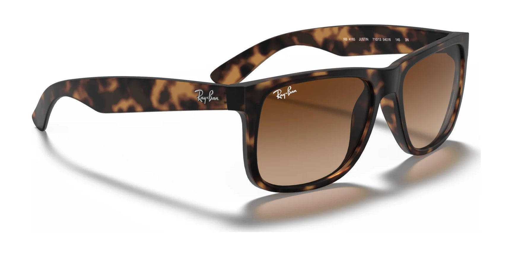 Ray-Ban JUSTIN RB4165 sunglasses offer a bold square shape with tortoiseshell frames, brown gradient lenses, and 100% UV protection. The iconic Ray-Ban logo adorns the arms.