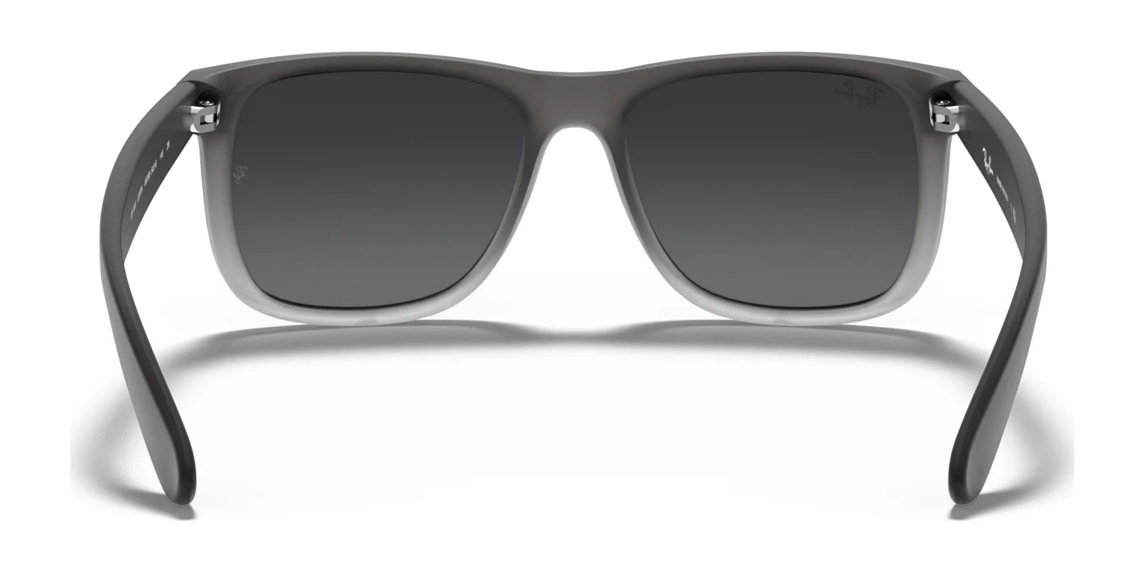 The Ray-Ban JUSTIN RB4165 sunglasses feature a square shape with a matte gray finish, offering 100% UV protection. Photographed front-on against a white backdrop, they seamlessly blend style and functionality.