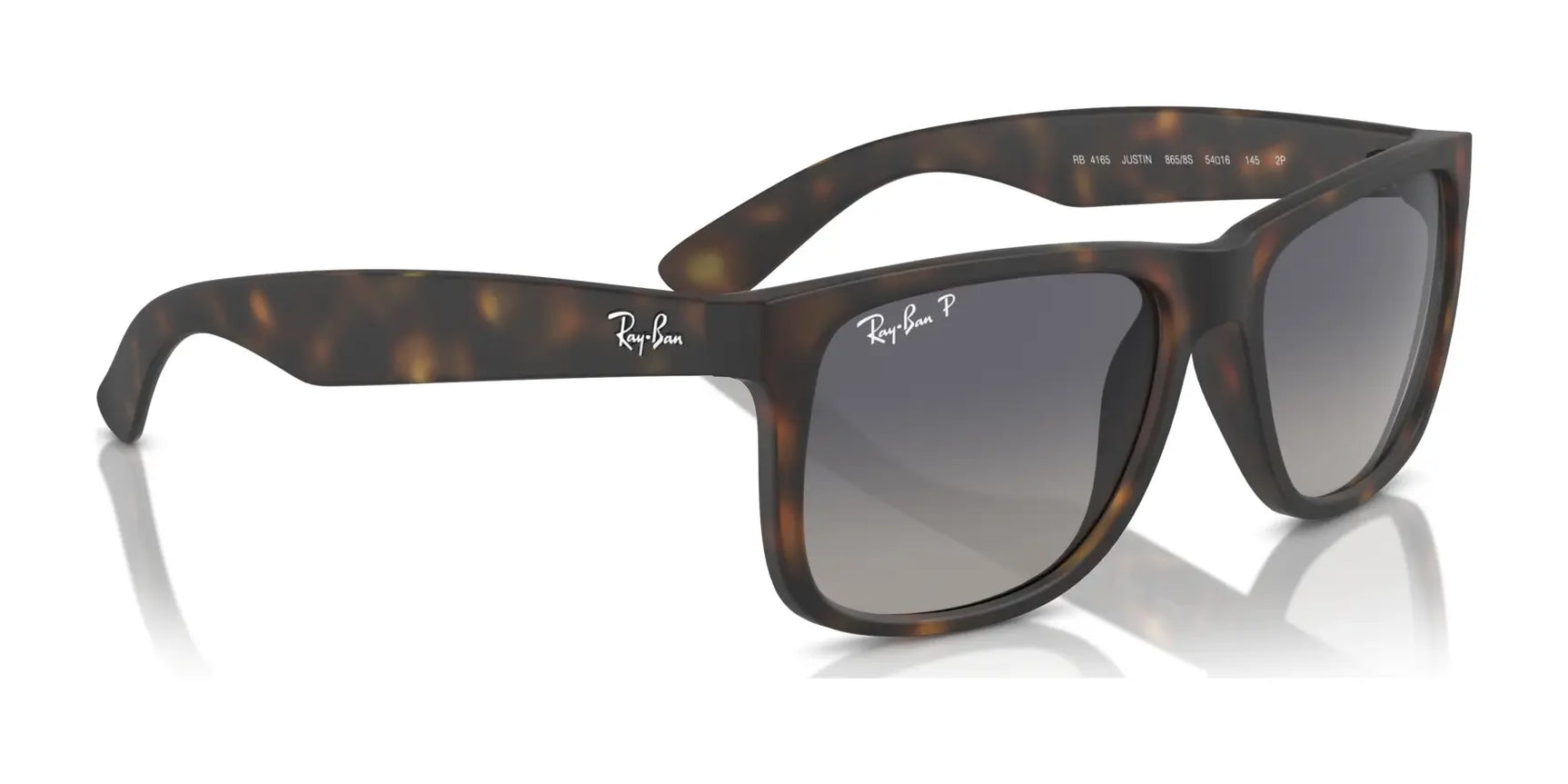 The Ray-Ban JUSTIN RB4165 tortoiseshell sunglasses have dark gradient lenses providing 100% UV protection, featuring the iconic branding on the temples.