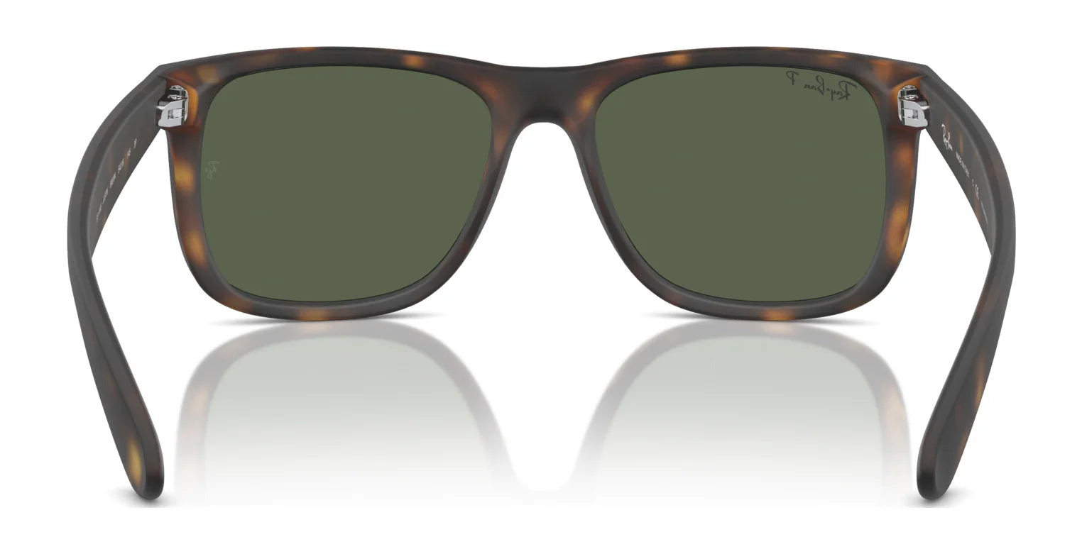 The Ray-Ban JUSTIN RB4165 sunglasses feature a tortoiseshell frame with green lenses, ensuring 100% UV protection when viewed from the front.