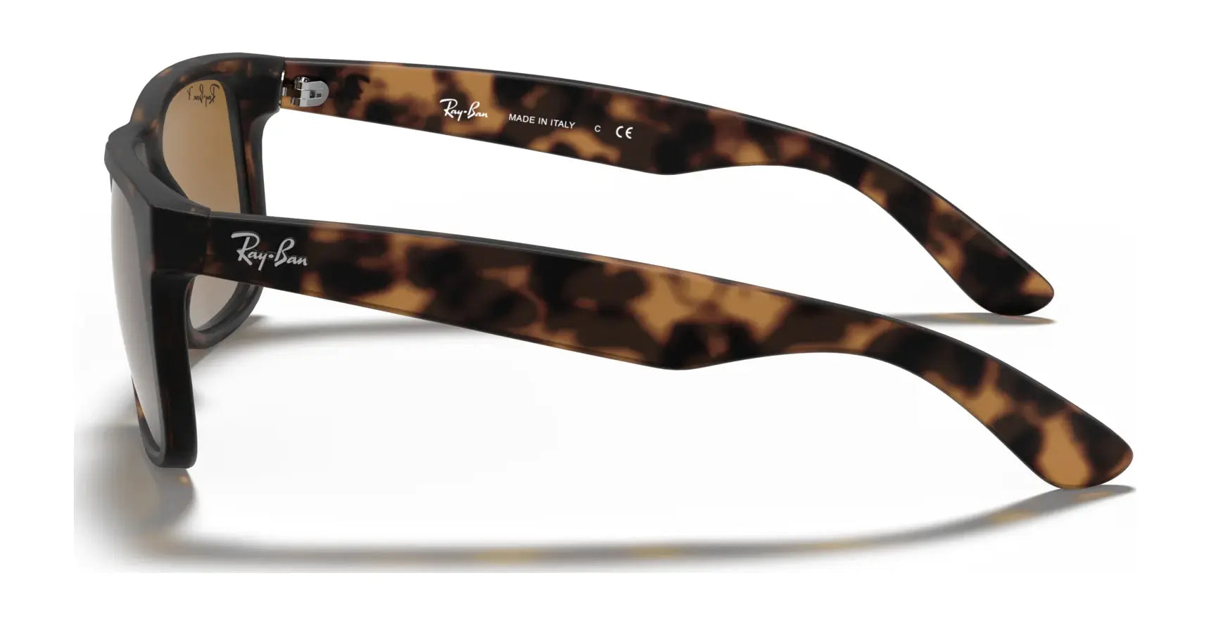 Side view of Ray-Ban JUSTIN RB4165 tortoiseshell square sunglasses with branding on the arms, featuring 100% UV protection.