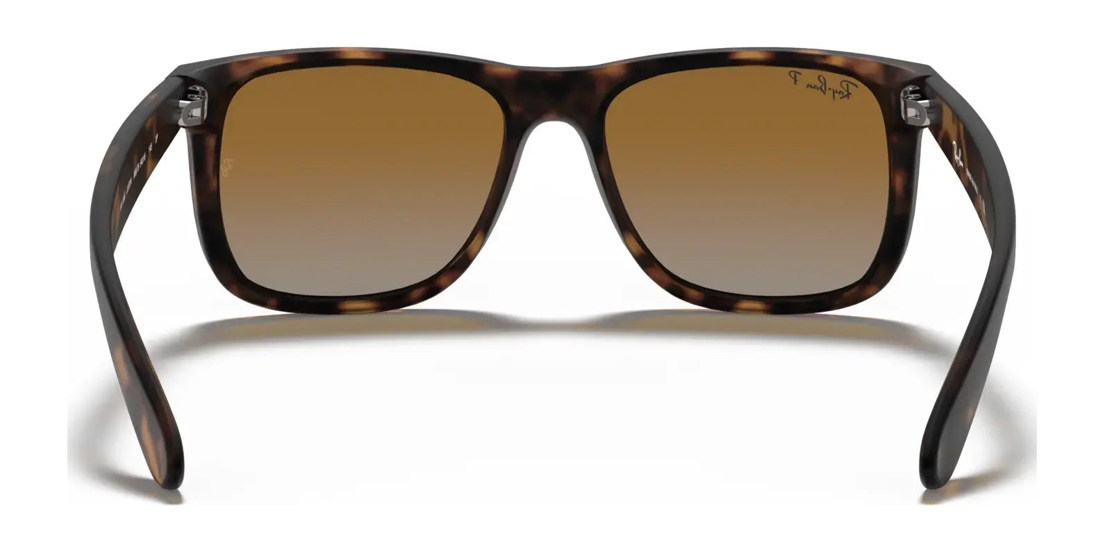 The Ray-Ban JUSTIN RB4165 sunglasses in tortoiseshell have gradient brown lenses and provide 100% UV protection.