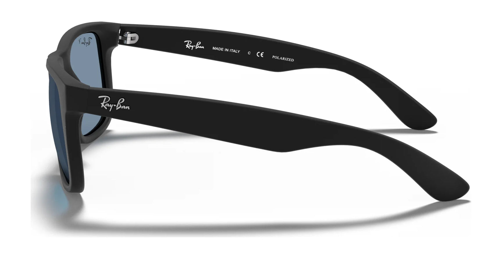 Side view of Ray-Ban JUSTIN RB4165F sunglasses showcasing a square black frame with polarized lenses and the iconic logo on the temples, providing reliable UV protection.