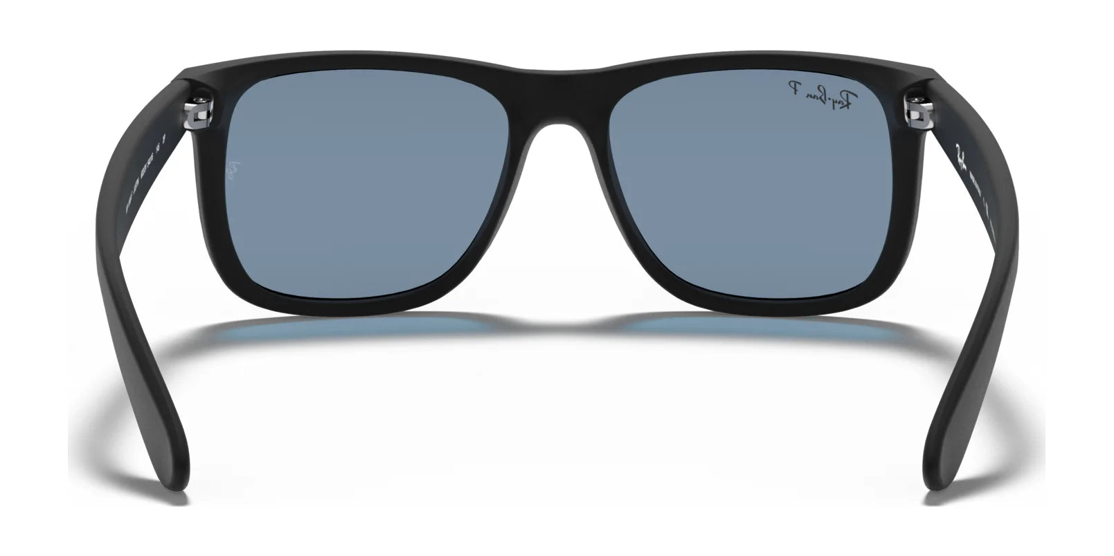 The Ray-Ban JUSTIN RB4165F sunglasses feature a sleek square frame and black finish with vivid blue lenses, offering UV protection for style and safety.