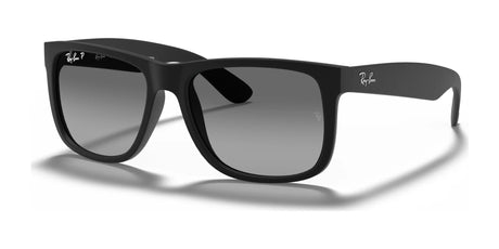 The Ray-Ban JUSTIN RB4165F sunglasses in Rubber Black №622/T3 feature stylish square frames and gradient lenses, providing elegant UV protection against the sun.