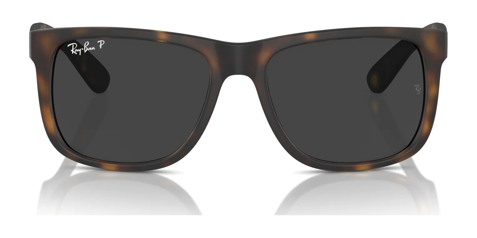 The Ray-Ban JUSTIN RB4165F sunglasses feature a tortoiseshell design, dark reflective lenses, and a stylish square frame, offering excellent UV protection.