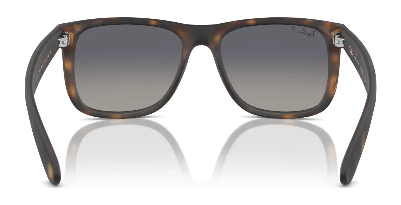 These Ray-Ban JUSTIN RB4165F sunglasses boast tortoiseshell square frames and gradient lenses for chic UV protection. Photographed front-facing on a white background, they seamlessly combine style with practicality.