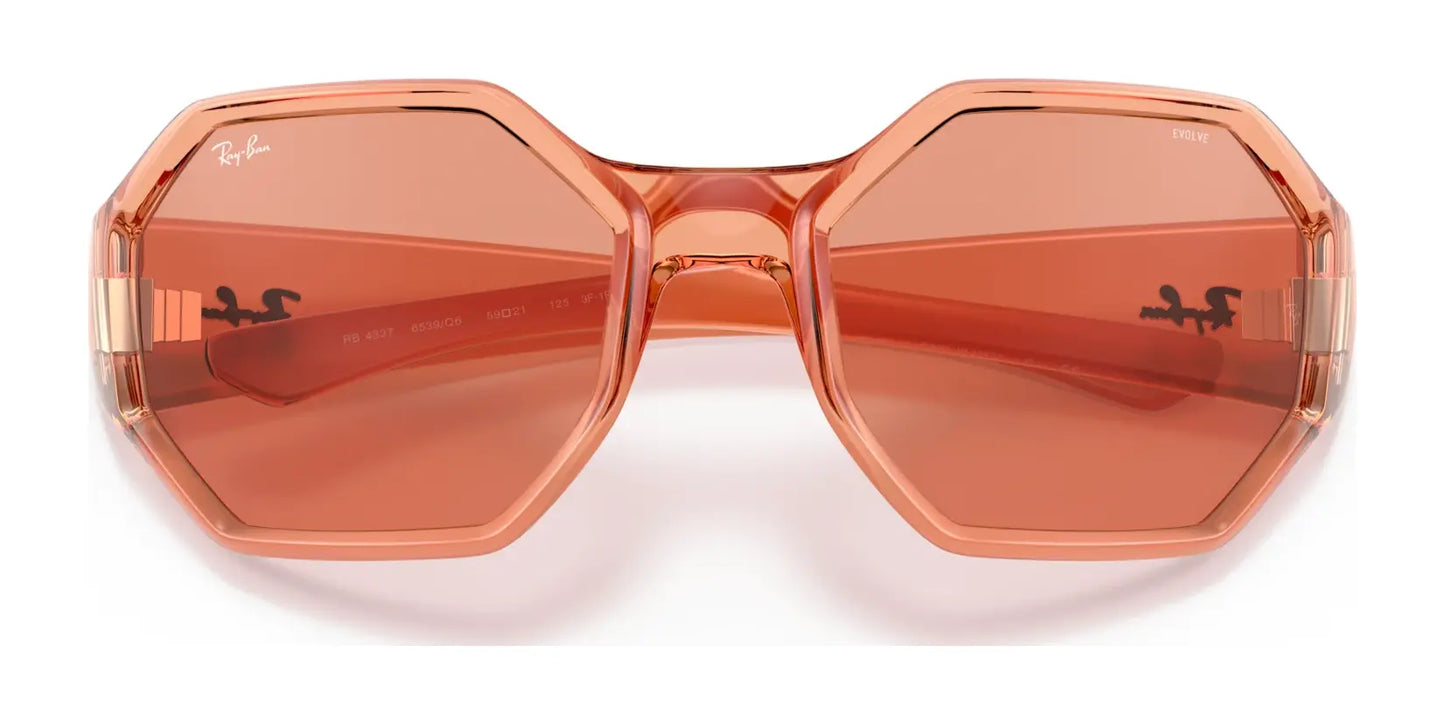 The Ray-Ban RB4337 Sunglasses | Size 59 feature an octagonal design with rose-tinted lenses, a transparent pink frame, and gold accents on the temples, providing superior UV protection.