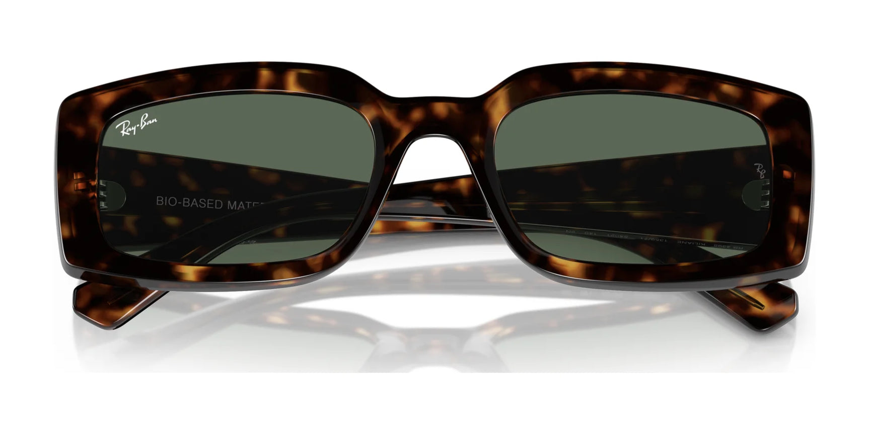 Ray-Ban KILIANE RB4395 Sunglasses, Size 54, showcase rectangular tortoiseshell bio-based acetate frames with green lenses, providing stylish UV protection on a white backdrop.