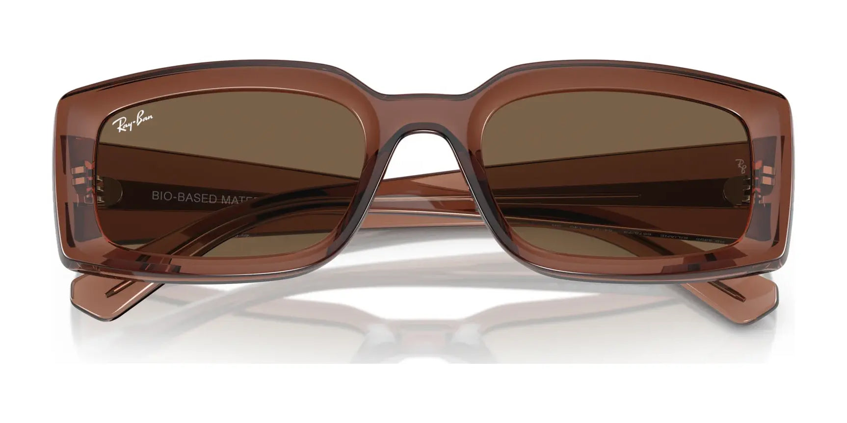 The Ray-Ban KILIANE RB4395 Sunglasses, Size 54, feature a rectangular frame in brown bio-based acetate matte finish with dark UV-protective lenses, styled against a white background.