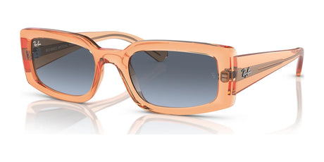 Ray-Ban KILIANE RB4395 Sunglasses, Size 54, in Transparent Orange №66868F feature rectangular frames made from bio-based acetate with gradient gray lenses offering UV protection against a white background.