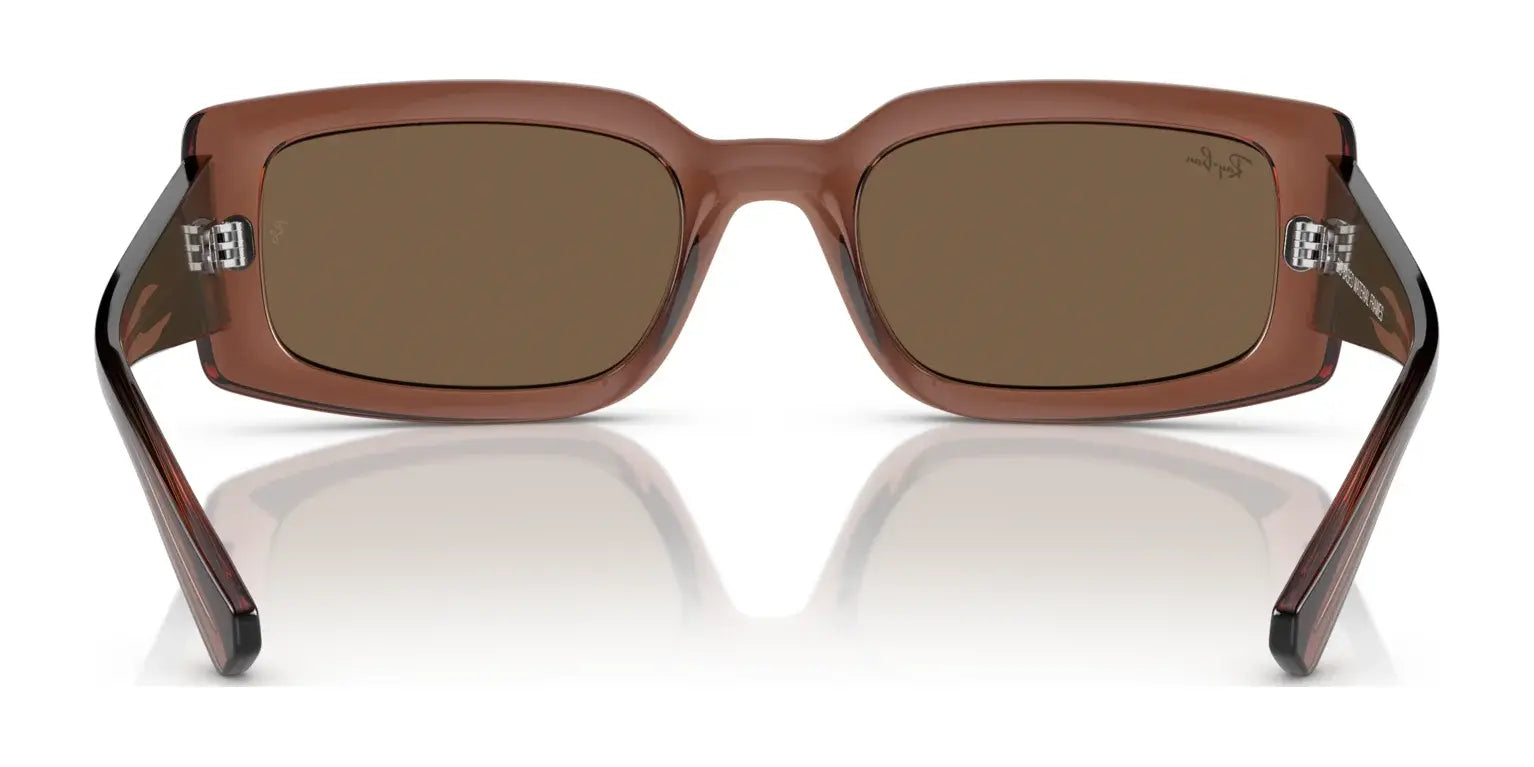 Ray-Ban KILIANE RB4395F Sunglasses Size 54 feature brown rectangular frames with dark tinted lenses and a glossy finish, epitomizing luxury eyewear.