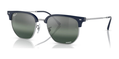 Discover the stylish elegance of Ray-Ban NEW CLUBMASTER RB4416 Sunglasses, featuring dark UV-protected lenses, a sleek metal frame, and a chic black top rim.