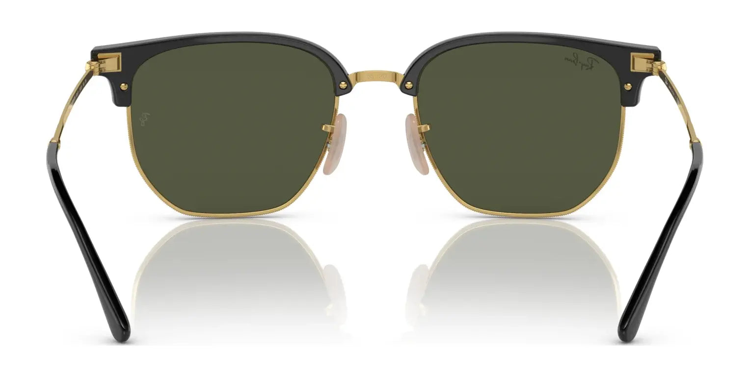 Front view of Ray-Ban NEW CLUBMASTER RB4416F sunglasses in size 55, featuring polarized dark green lenses, sleek black frames, and elegant gold accents.