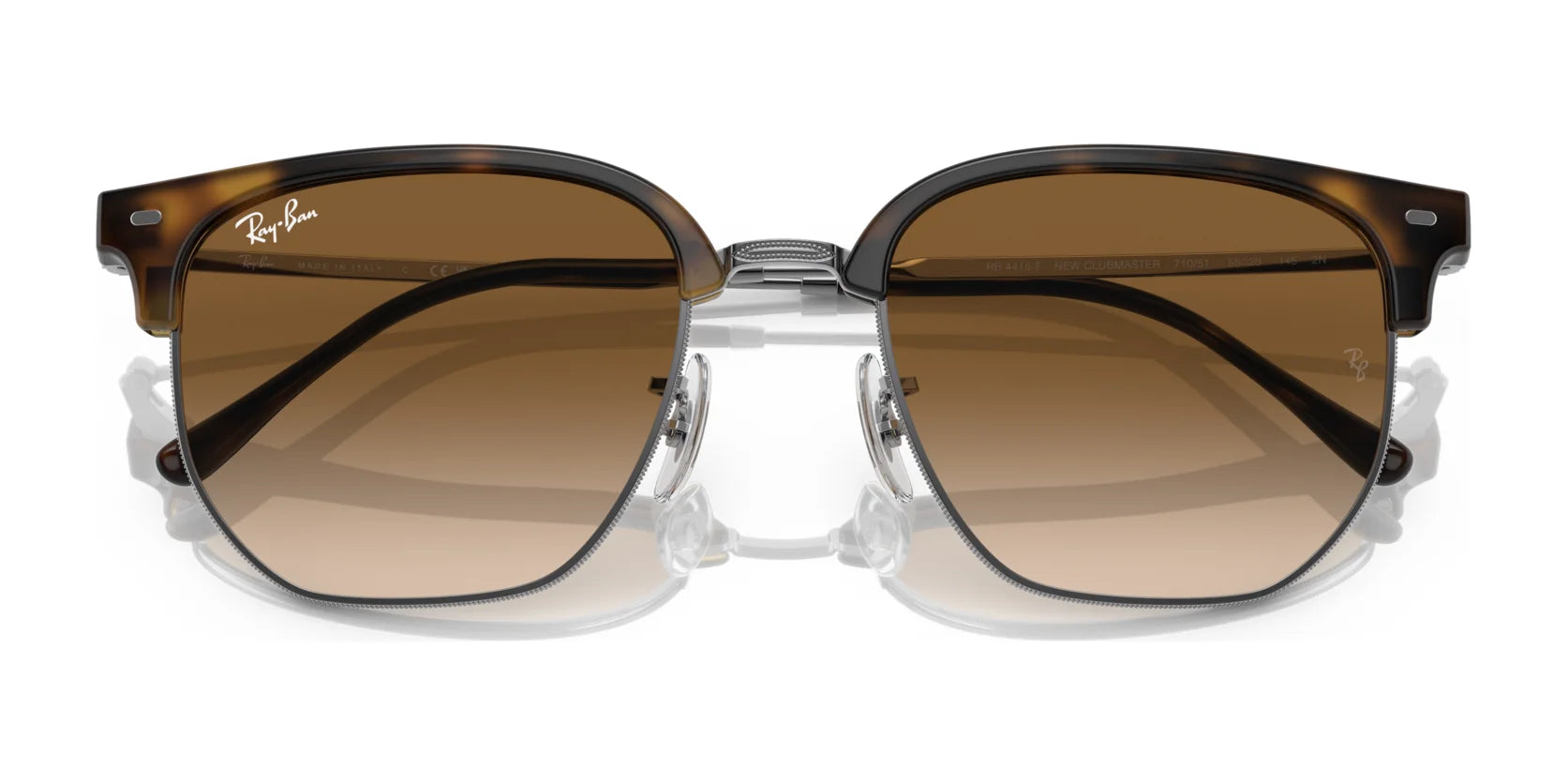 Experience the stylish allure of Ray-Ban's NEW CLUBMASTER RB4416F sunglasses with brown gradient square lenses, a transparent nose bridge, and thin temples. These polarized lenses offer exceptional clarity and protection in a classic Clubmaster design.