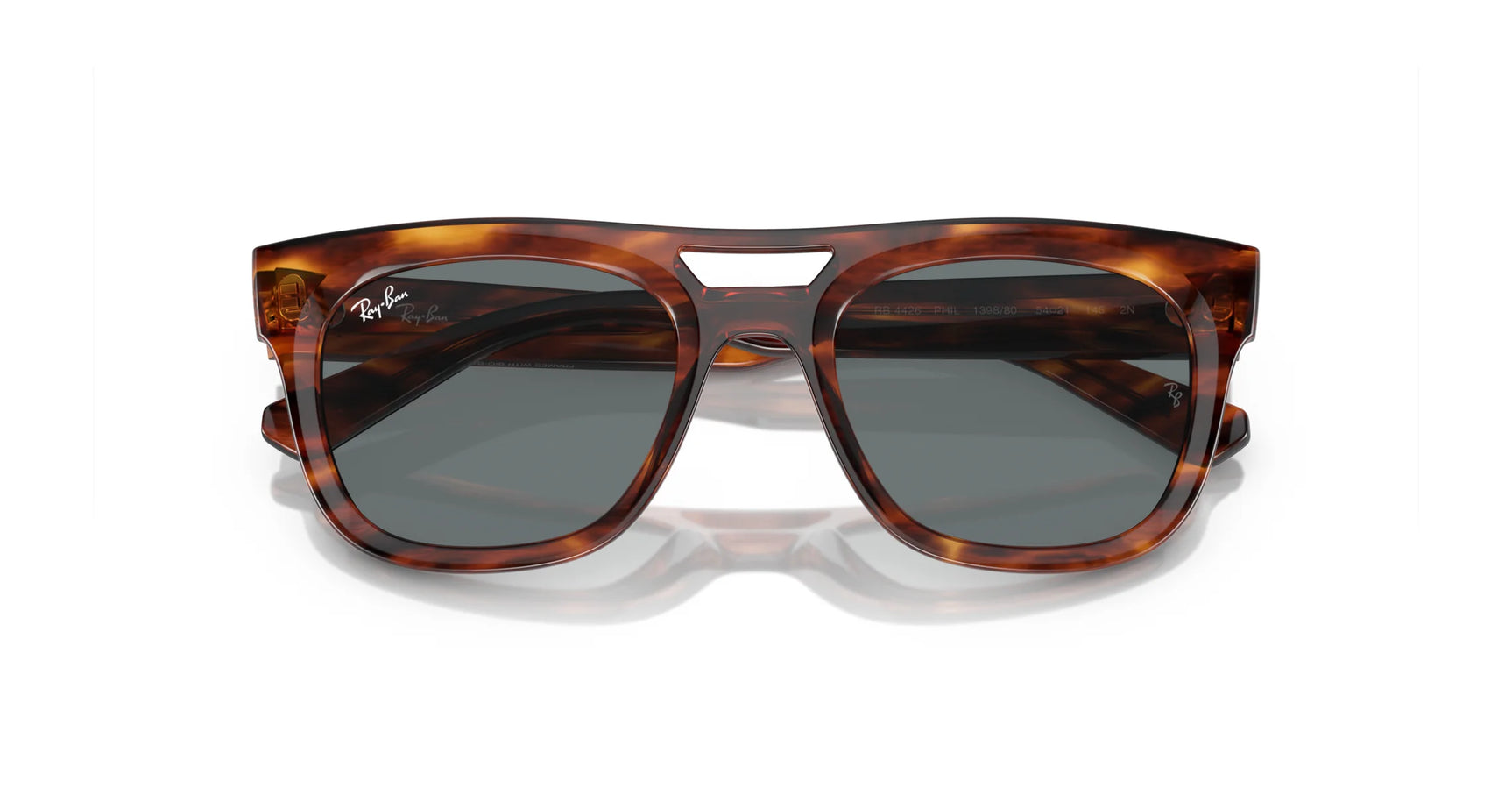 Ray-Ban PHIL RB4426 Sunglasses, Size 54, feature a squared design crafted from bio-based acetate with tortoiseshell frames and dark lenses against a white background.