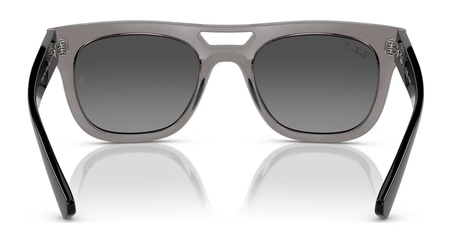 The Ray-Ban PHIL RB4426 Sunglasses in Size 54 feature a gray and black design with gradient lenses, offering a squared silhouette and ultimate protection, shown from the front.