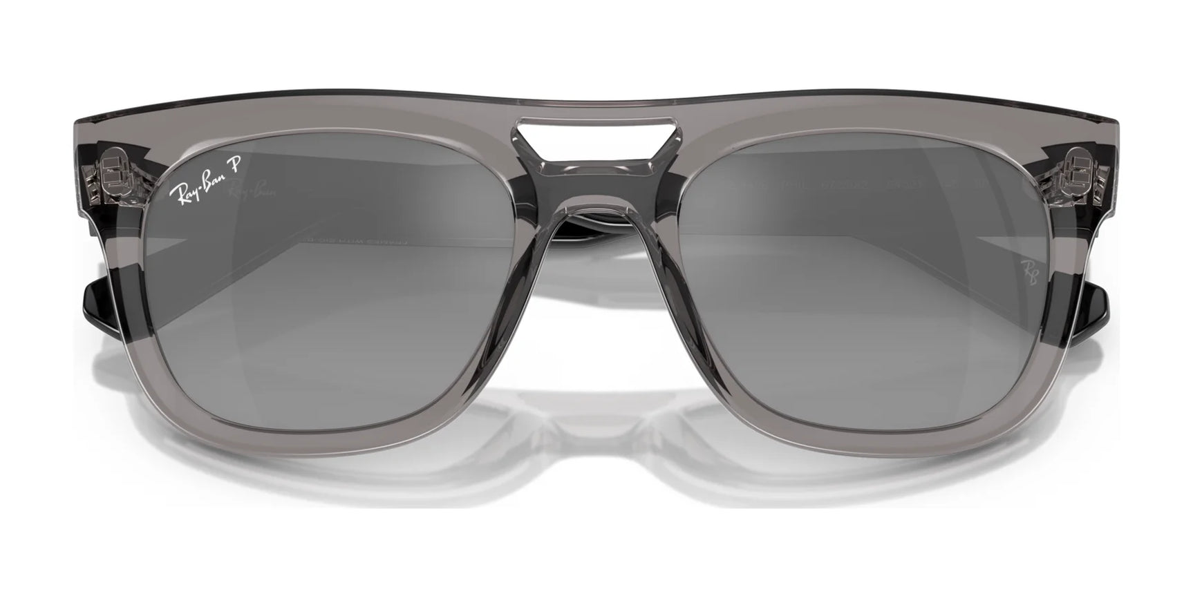 Explore the Ray-Ban PHIL RB4426 Sunglasses, size 54, with a square design, transparent frame, dark UV-protective lenses.