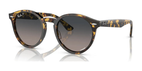 Yellow Havana Ray-Ban LARRY RB7680S sunglasses feature gradient lenses, premium acetate round frames, and the brand’s signature logo on the temple and lens.