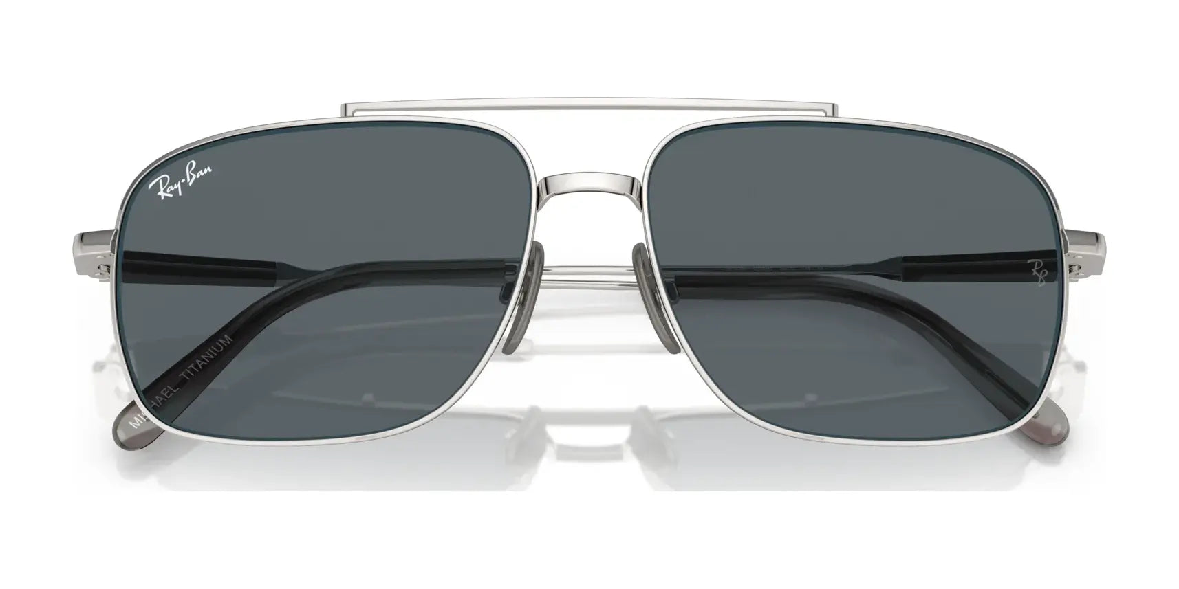 The Ray-Ban MICHAEL TITANIUM RB8096 sunglasses, size 59, boast silver frames with dark lenses for UV protection and feature a stylish double bridge and thin temples.