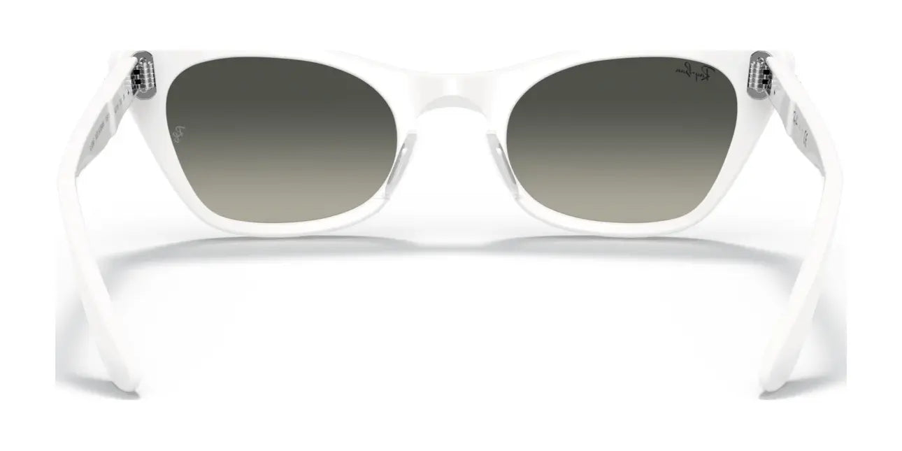 Ray-Ban MISS BURBANK RJ9099S sunglasses in white feature a chic, stylish frame with dark lenses for UV protection. Viewing from the back highlights the frame and temples, making it perfect for fashion-forward individuals seeking both flair and functionality. Ideal size: 45.