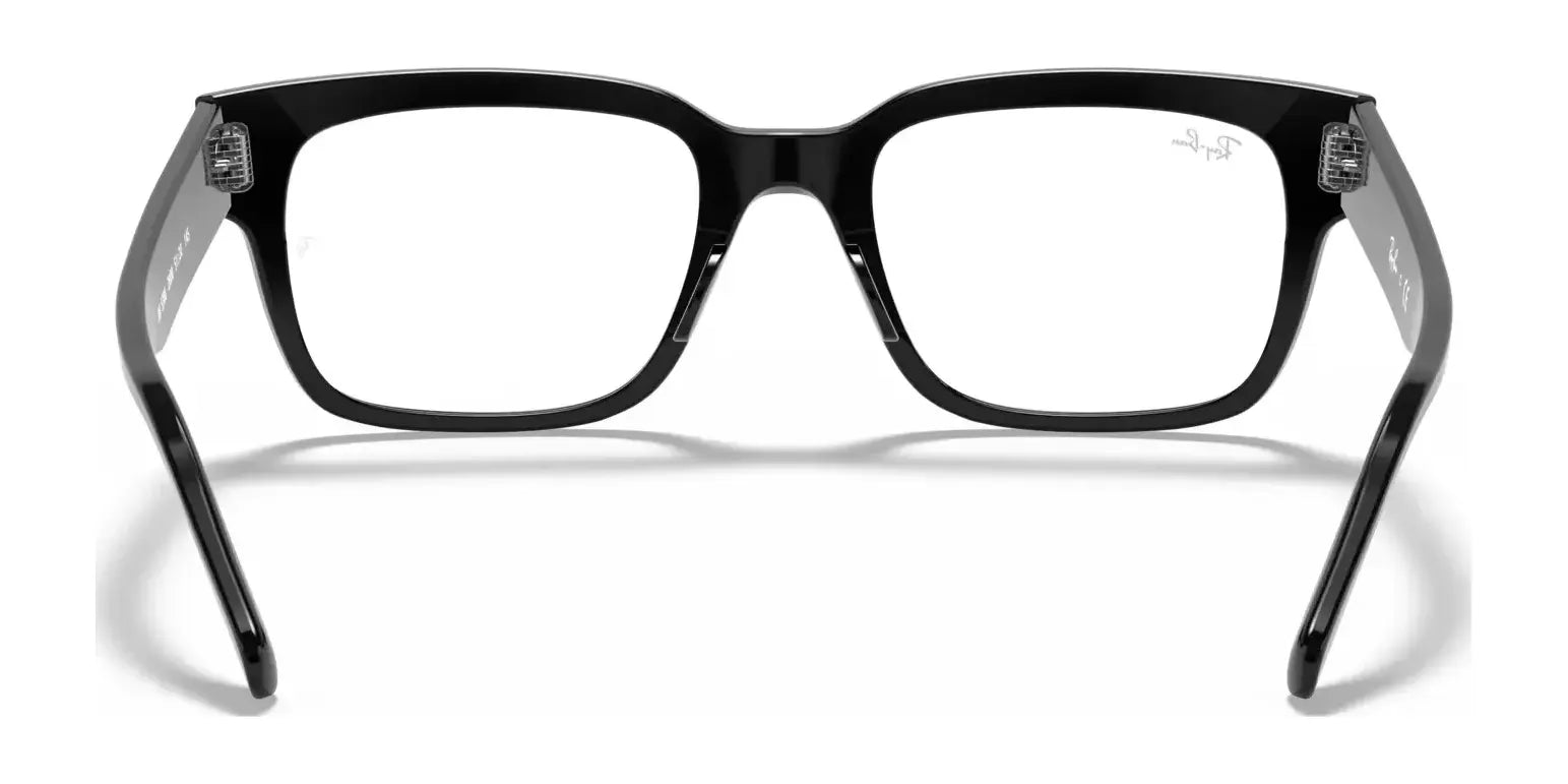 The Ray-Ban JEFFREY RX5388 eyeglasses feature a sleek black square frame with clear lenses, making them a fashionable choice for men's eyewear collections.