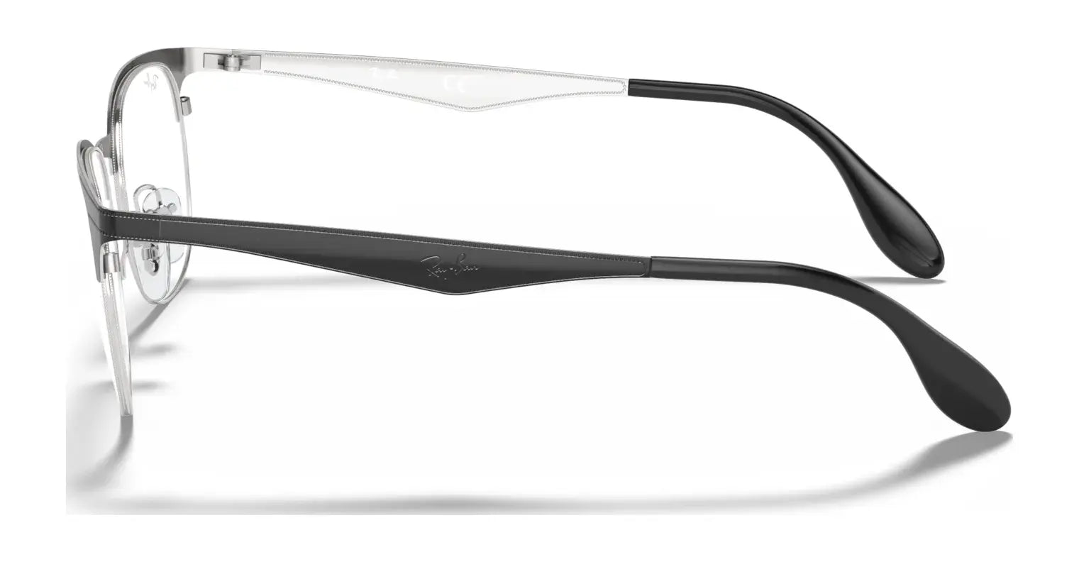 Side view of Ray-Ban RX6346 eyeglasses with a silver frame, featuring black temple tips and crystal-clear lenses, equipped with adjustable nose pads against a white background.