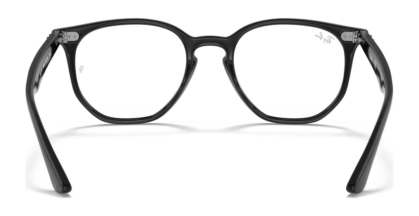 Ray-Ban's HEXAGONAL RX7151 eyeglasses, size 52, feature a black, round design with clear lenses and showcase the brand's iconic style against a white backdrop.