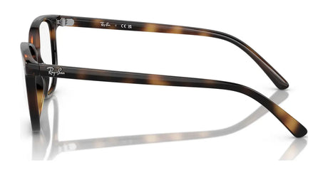 Side view of the tortoiseshell Ray-Ban JUNIOR ELLIOT RY9097V eyeglasses featuring the iconic brand logo on the temples, designed perfectly for kids, set against a white background.