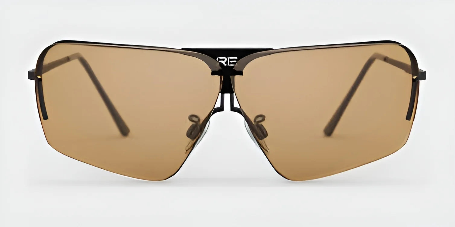 Brown-tinted sunglasses featuring angular lenses and a frameless design showcase the sleek style of RE Ranger Edge Shooting Glasses, with thin black arms set against a white background.