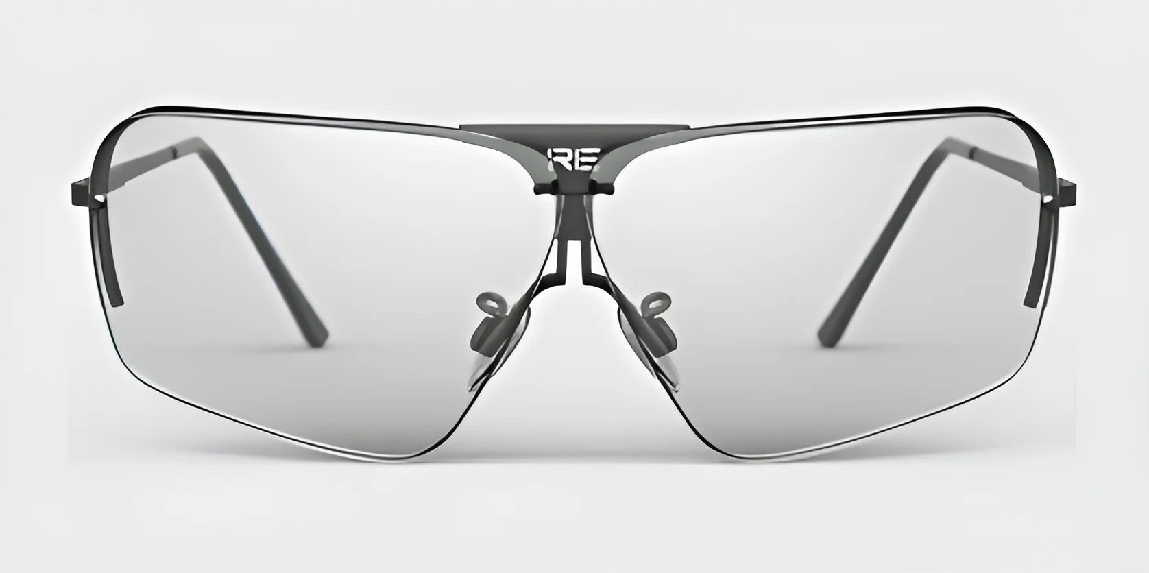 RE Ranger's Edge Shooting Glasses feature oversized aviator-style frames in gray, equipped with distinctive angular, mirrored NexPC lenses and a pronounced bridge.