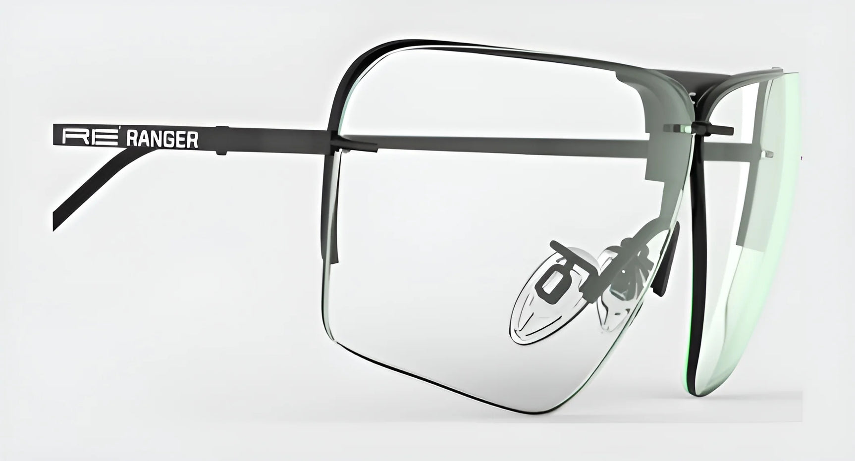 The minimalist RE Ranger Edge Shooting Glasses from RE Ranger feature sleek, angular lenses and adjustable nose pads against a pristine white background.