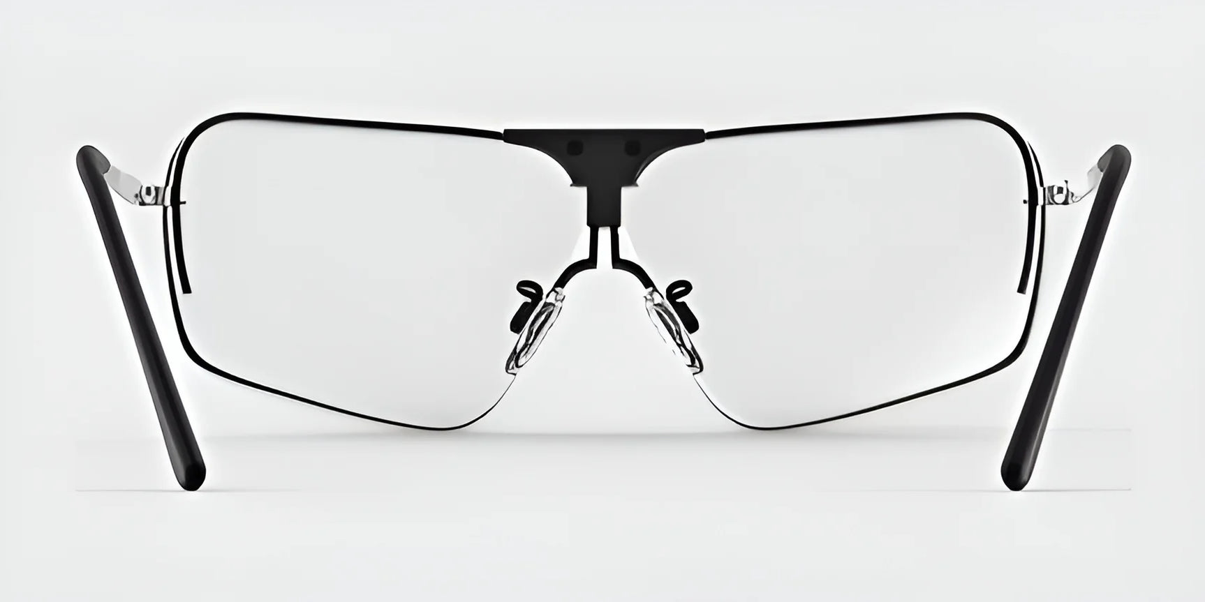 The RE Ranger Edge Shooting Glasses offer a modern look with angular lenses and black temples, featuring a sleek design against a plain background.