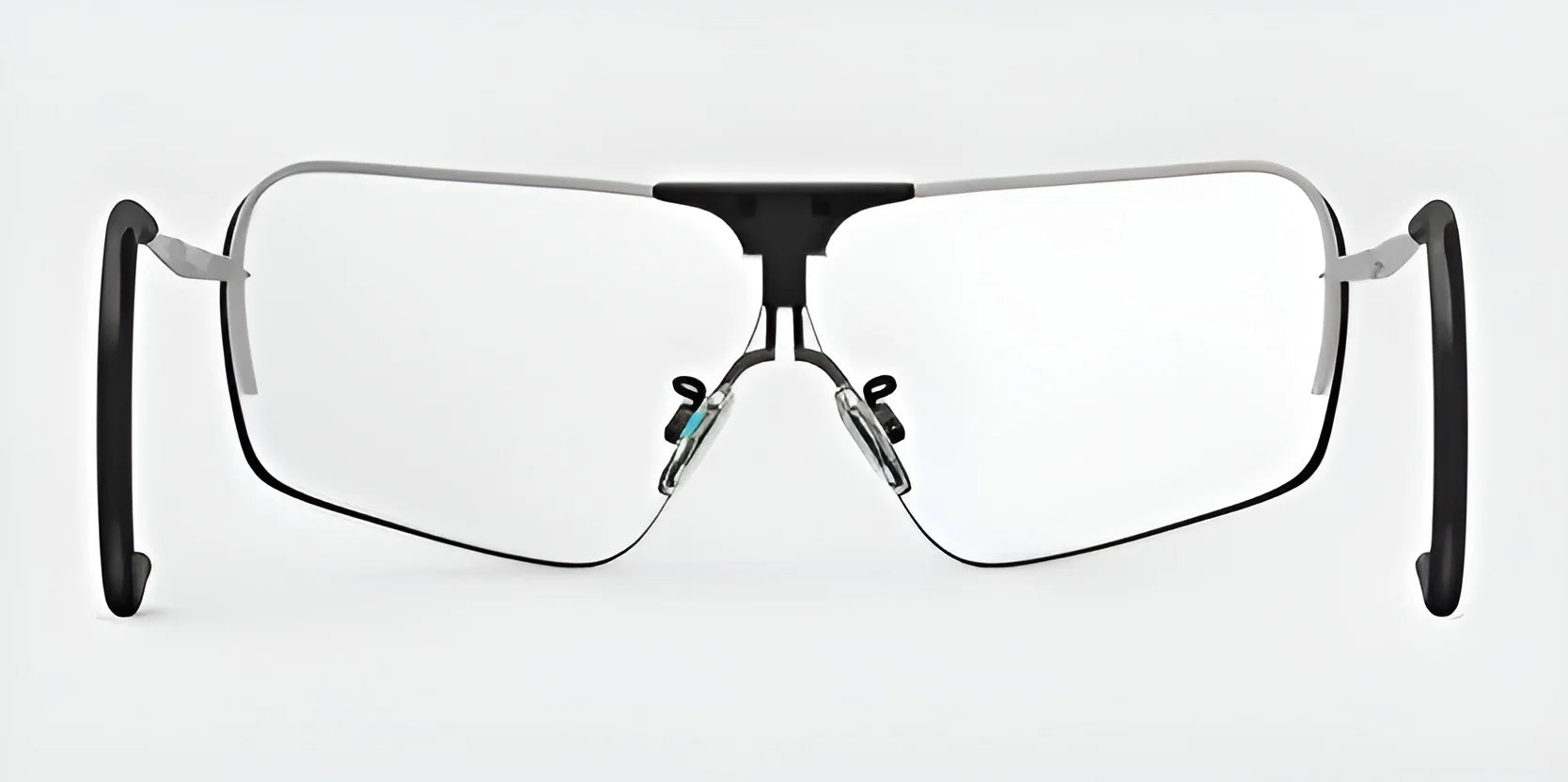 RE Ranger Edge Shooting Glasses feature a minimalist design with thin metal frames and clear lenses, crafted by RE Ranger for optimal optical performance against a plain background.