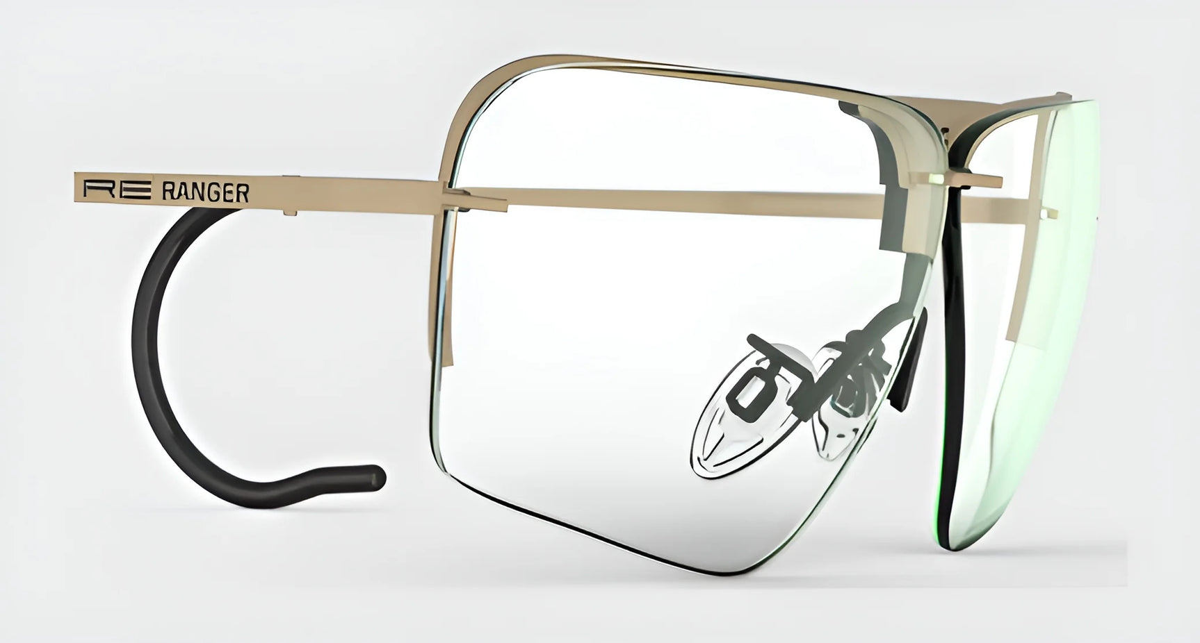 The RE Ranger Edge Shooting Glasses by RE Ranger showcase a futuristic design with oversized angular lenses and a gold frame, offering unparalleled optical performance.