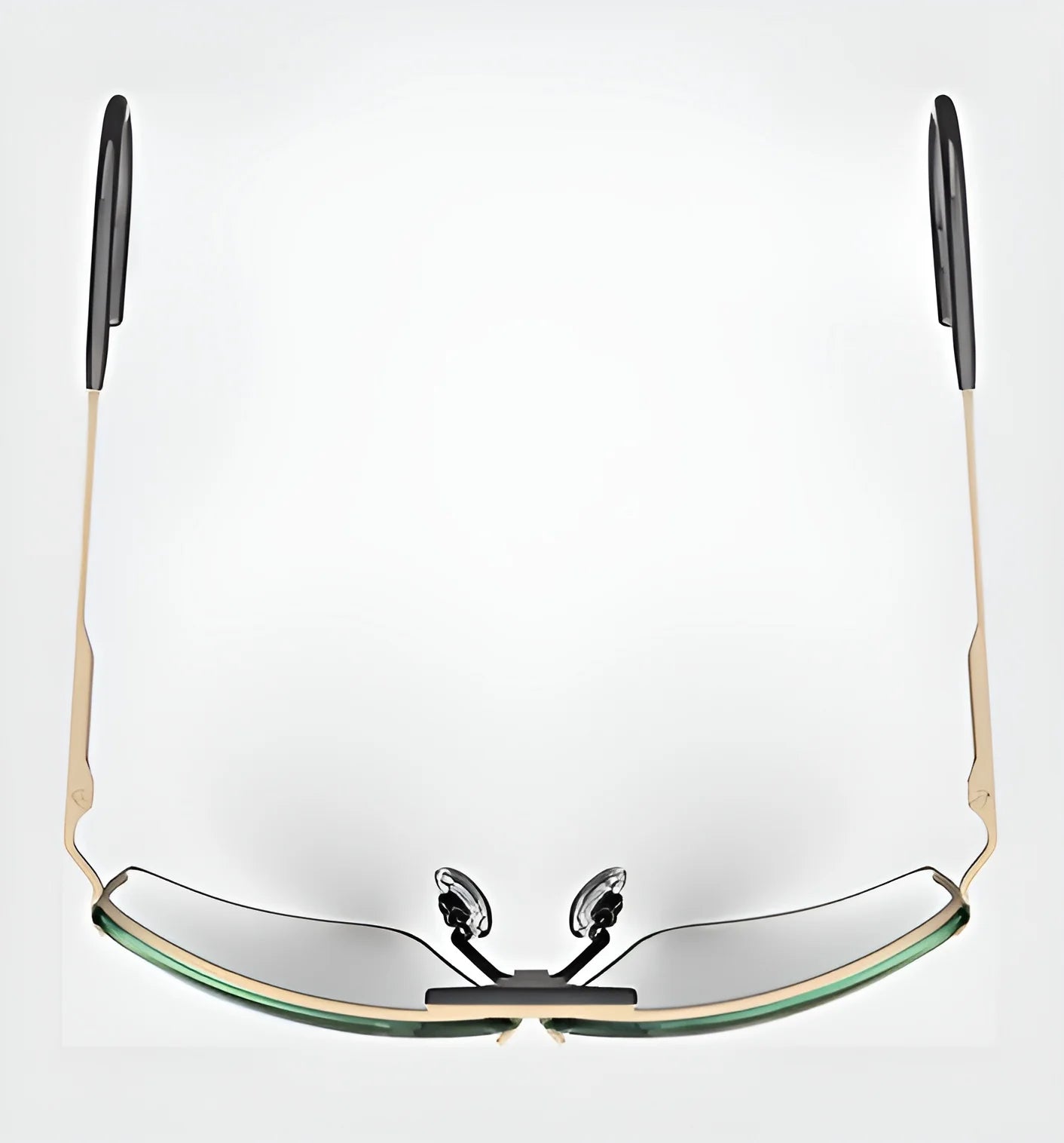 The RE Ranger Edge Shooting Glasses by RE Ranger feature a minimalist design with thin gold frames, sleek black tips on the arms, and angular lenses for a sharp, stylish look when viewed from the front.