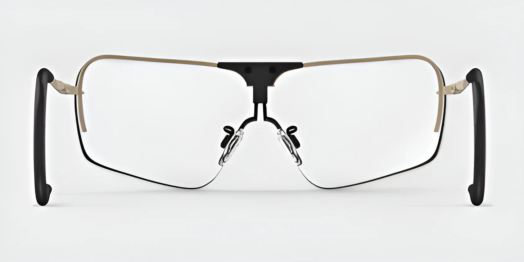 The RE Ranger Edge Shooting Glasses by RE Ranger showcase a minimalist design with angular lenses, a thin metal frame, and angled black temples set against a white background, providing exceptional optical performance.