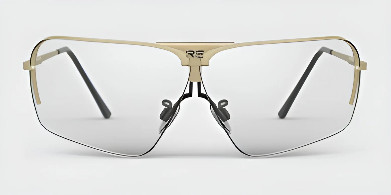 The RE Ranger Edge Shooting Glasses by RE Ranger are large sunglasses with metallic frames and angular lenses, featuring a clear bridge and grey tint for enhanced optical performance.