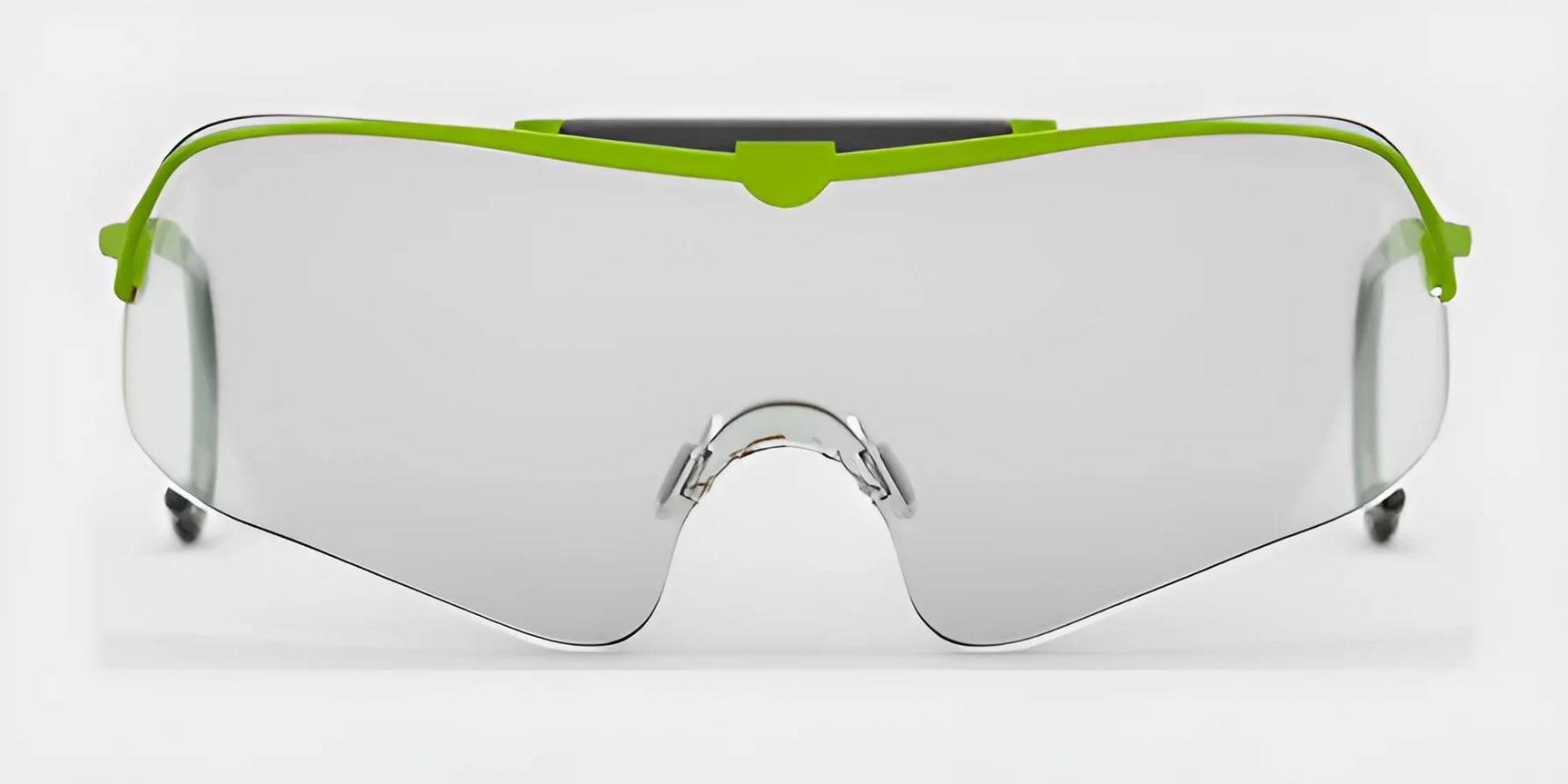 The RE Ranger Falcon Pro Shooting Glasses feature a futuristic design with an aerodynamic lens and large, clear construction, accented by bold green frames and enhanced with CombatCoat technology.