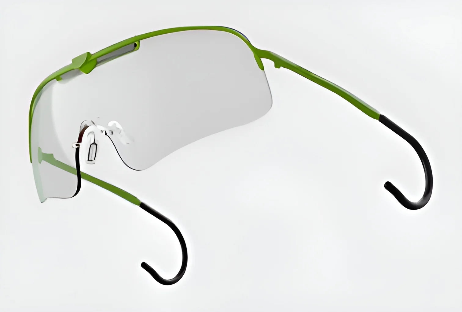 Highlighted by a sleek design, the RE Ranger Falcon Pro Shooting Glasses boast green rims and clear aerodynamic lenses with black ear hooks. These shooting glasses by RE Ranger are perfect for precision activities, effortlessly combining style and functionality.