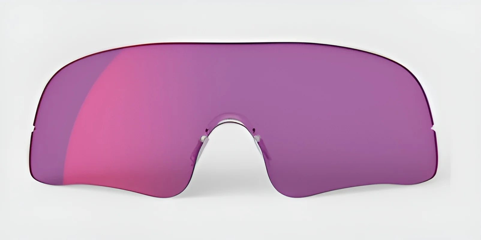 A large, curved visor with a purple tint, similar to the RE Ranger Falcon Pro Lens by RE Ranger, is showcased on a plain background. Ideal for outdoor activities, it ensures optimal vision to elevate your adventures.