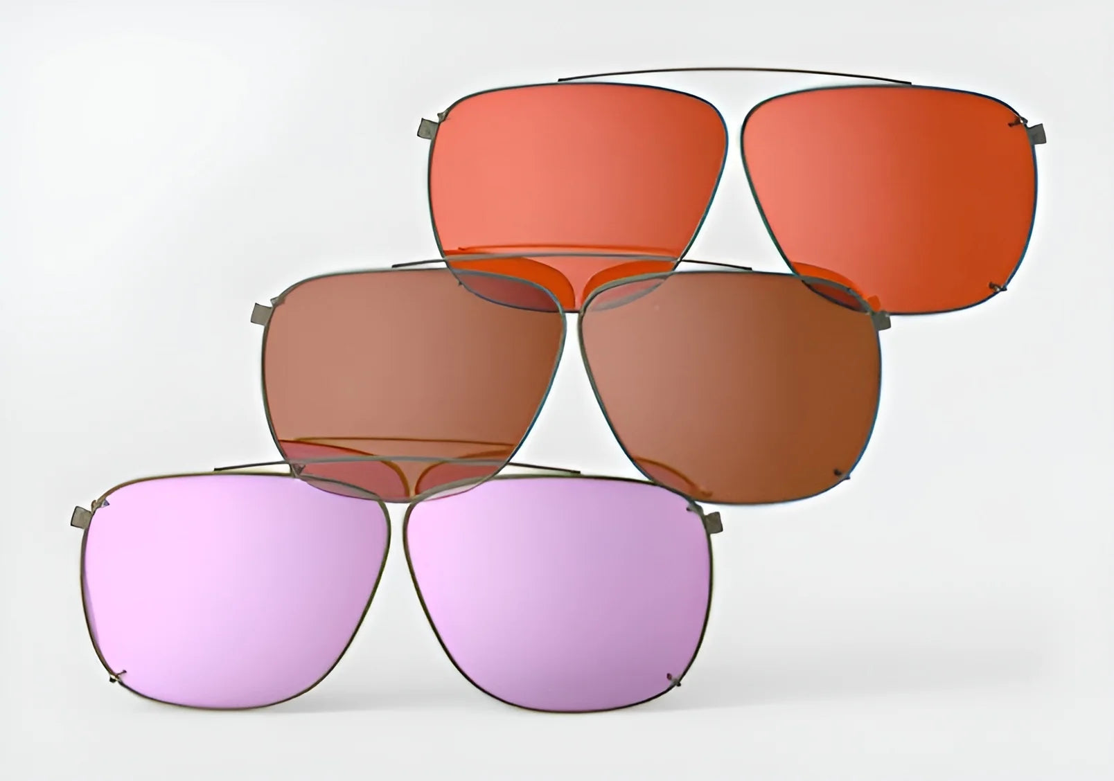 The RE Ranger Sporter Clip-On Lens Kit by RE Ranger includes five pairs of sunglasses with various colored lenses, elegantly displayed in a pyramid formation against a white background.