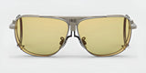 Front view of the RE Ranger Sporter Shooting Sunglasses featuring yellow lenses and a brushed pewter frame with "RE" engraved on the bridge.