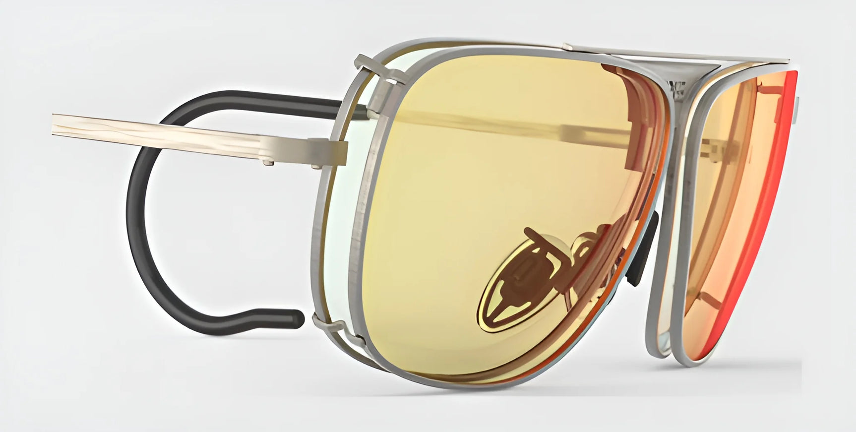 The RE Ranger Sporter Shooting Sunglasses by RE Ranger feature a brushed pewter frame with large yellow-orange lenses and extended black nose pads, set against a white background. Ideal for outdoor sports enthusiasts needing durable prescription glasses.