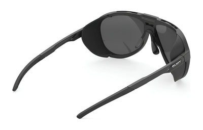 Rudy Project Stardash Sunglasses | Size 63: Black wraparound sports sunglasses with side shields and Rudy Project logo on the temple, featuring interchangeable lenses for versatile performance.