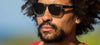 Tifosi Optics SMIRK Sunglasses | Size 49 / Aqua Shimmer/Smoke Tint with Rose Pink Mirror