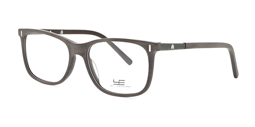 The Yeti FOSSILIZED Eyeglasses, size 57, feature black-rimmed rectangular lenses on a white background, highlighting their distinctive fossilized design.