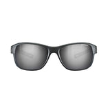 Julbo Camino Sunglasses | Size 58 are sleek black eyewear with reflective photochromic lenses and a subtle logo on the temple, featuring removable side shields for style and protection.