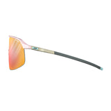 Julbo Density Sunglasses offer sleek performance with orange mirrored lenses and a thin black and pink frame, featuring CustomFit Temples for a tailored fit. These Julbo sunglasses seamlessly blend style and functionality when viewed from the side.